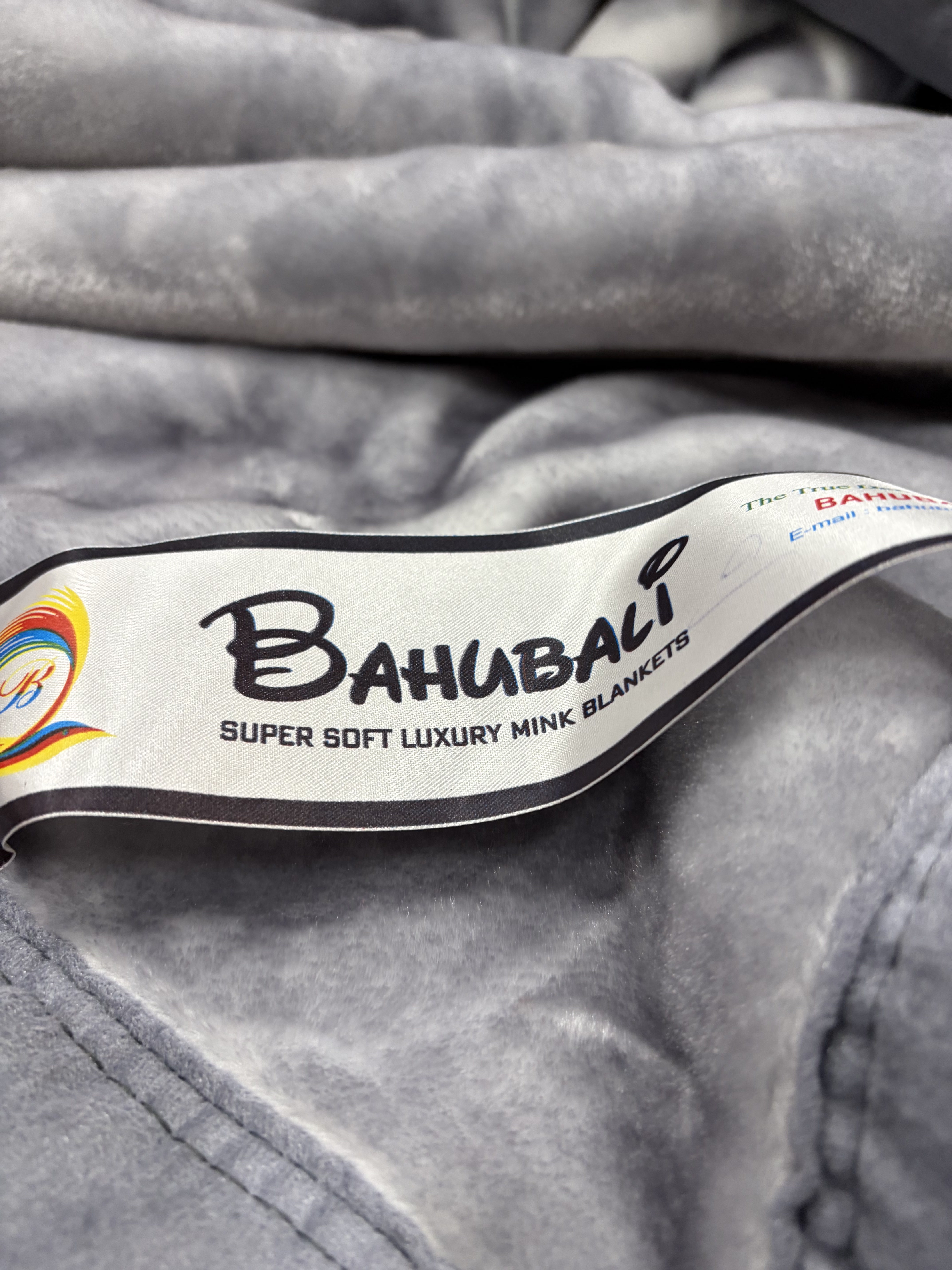 Bahubali brand tag sewn into a finished mink blanket