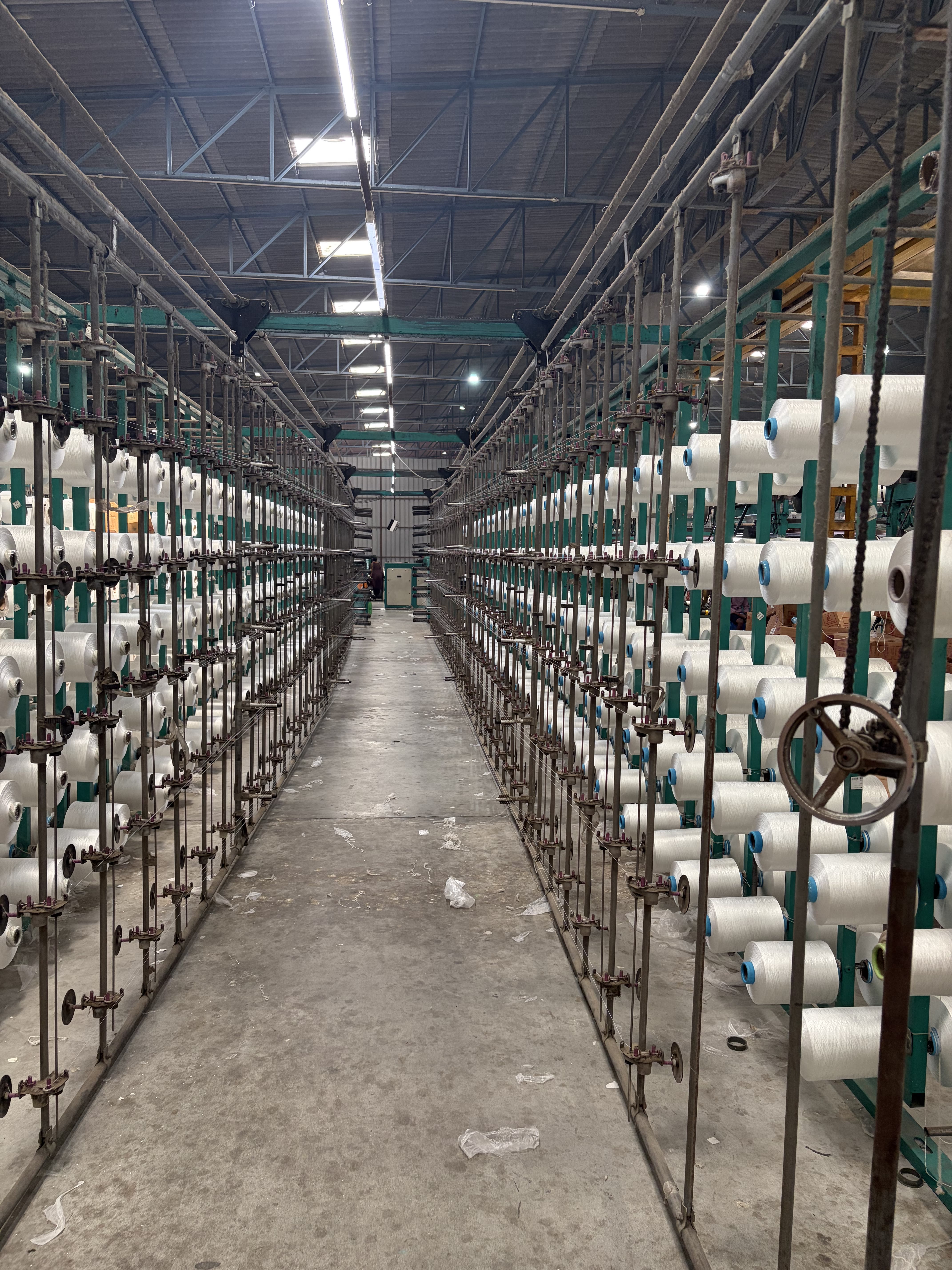 Polyester yarn being warped before weaving
